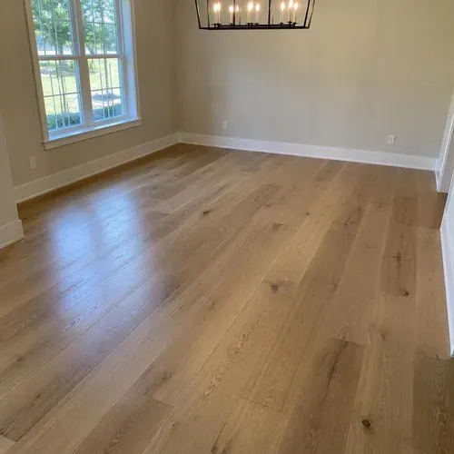 Wide plank engineered oak in a dining room