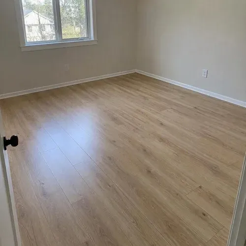 Light oak laminate floor, a durable value choice for Acton homes