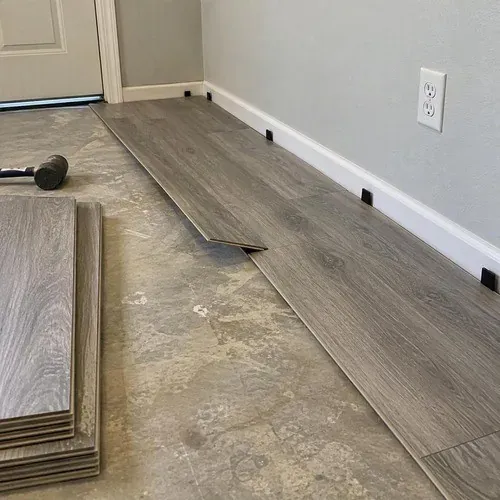 Vinyl plank flooring installed in a Kitchener basement